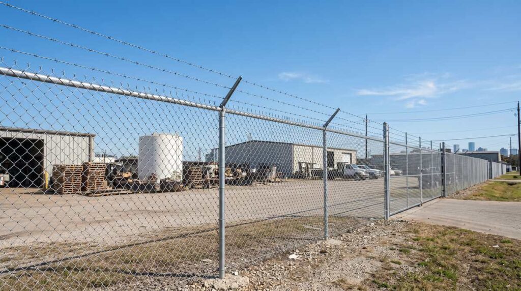 Barbed Wire Fence Installation in Houston, TX — Commercial Security Solutions | Griffin Fence
