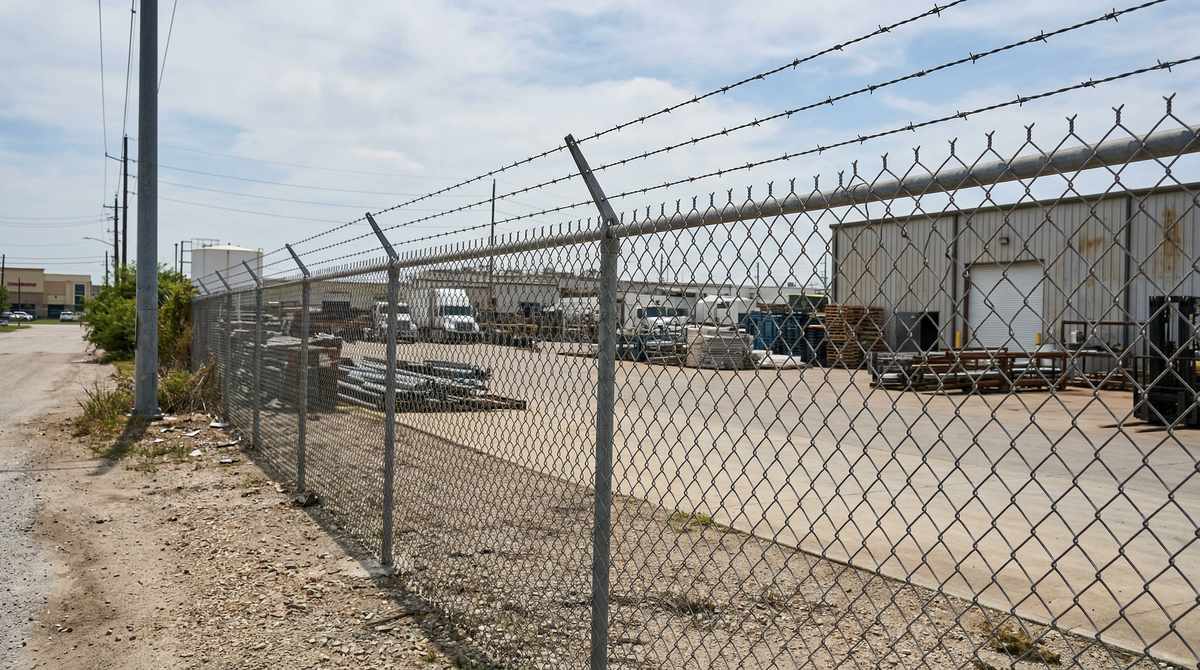 chain link fence with barbed wire - Griffin Fence Houston TX