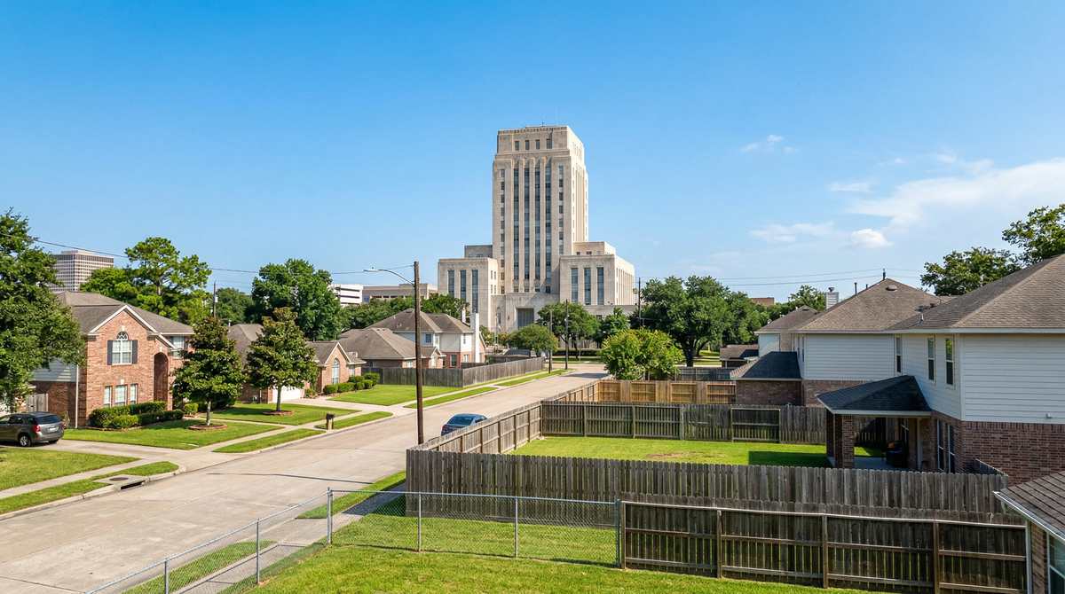 Houston Texas residential neighborhood with fences and city regulations concept
